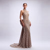 Woman wearing a sparkling evening gown on a white background