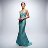 Shop our NYC-made Aqua Blue Brocade Trumpet Gown. Strapless sweetheart neckline with metallic silver floral embroidery. Available for special order in custom colors.