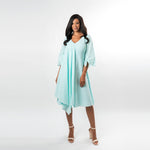 A draped overlay gives this fabulous piece a boho feeling while allowing you to show off your figure in a subtle way, extruding femininity. Made from a beautiful and airy cotton baby clip dot, this dress lends itfelf for many summer and spring affairs.