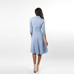 Not your ordinary shirt dress, this asymmetric hem wrap dress combines feminity with timeless classiness in a modern way.