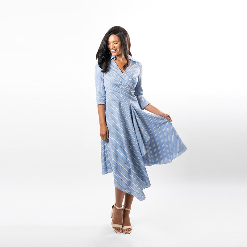 Not your ordinary shirt dress, this asymmetric hem wrap dress combines feminity with timeless classiness in a modern way.