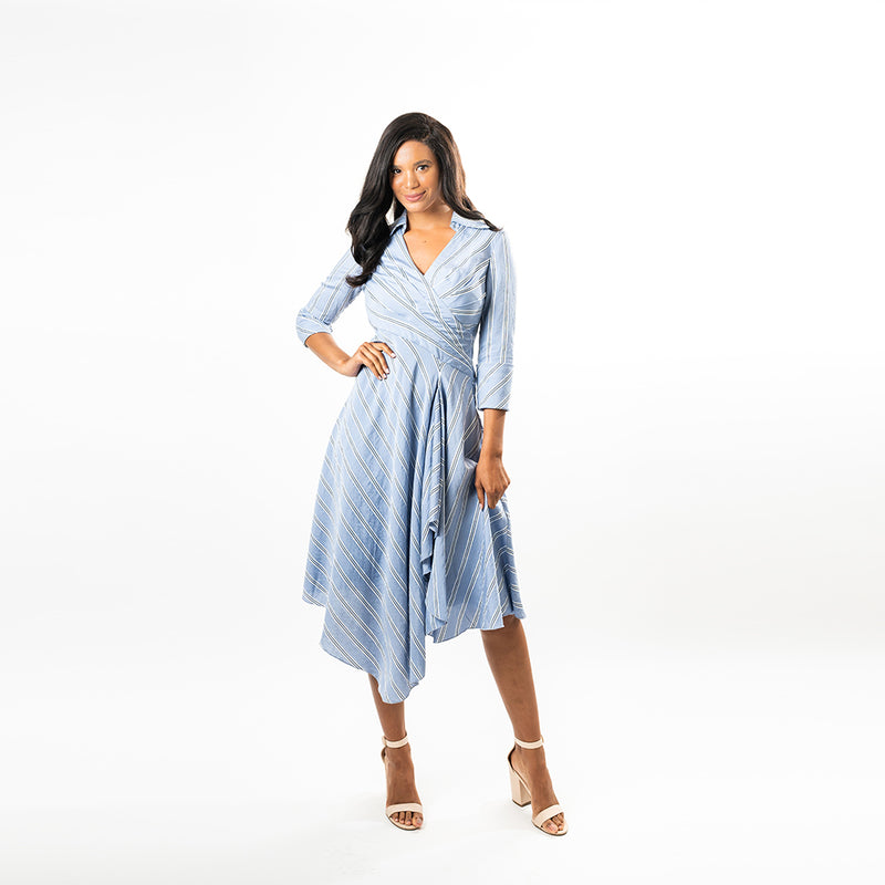 Not your ordinary shirt dress, this asymmetric hem wrap dress combines feminity with timeless classiness in a modern way.