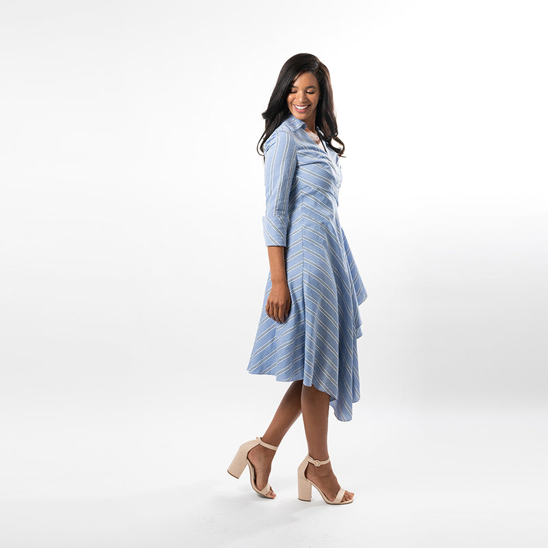 Not your ordinary shirt dress, this asymmetric hem wrap dress combines feminity with timeless classiness in a modern way.